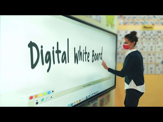 A woman using the digital whiteboard